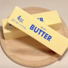 Butter Squishy – Puha nyomkodható stresszoldó Vaj formájú játék